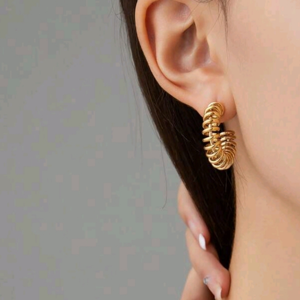 C-shape spring earrings; nwot; modern, minimalist; refined edgy
